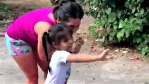 Thrilled family greets a very unusual visitor at their home