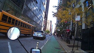 Standing on the bike lane plus a car turning on a green bike light