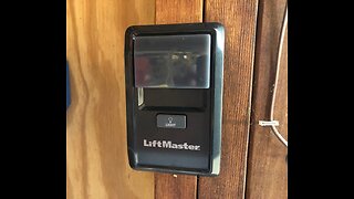 How to change the battery in a wireless garage door opener wall switch.