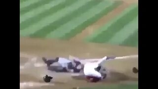 Baseball catcher gets plowed