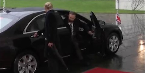 Theresa May STRUGGLING with her car door is everything you need to see today