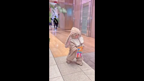 cute baby walking on a mall