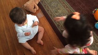Babies Playfully Fighting