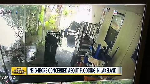 Unseasonable rains have Lakeland residents on edge as flood waters rise from drainage canal