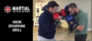 Hook punch sparring drill
