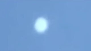 very large sphere UFO overhead