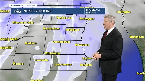 Light rain and snow tonight, then windy and mild