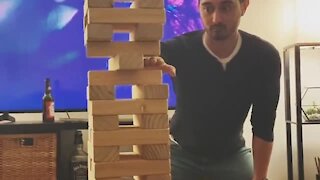 Guy successfully completes impossible Jenga move