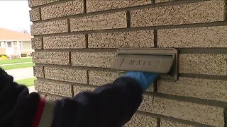 Mail carrier makes special delivery of groceries to elderly couple in need