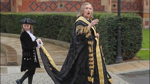 Hillary Clinton Heckled And Called "War Criminal" As She Enters Queens University In Belfast