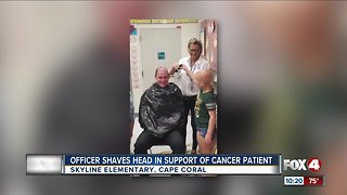 Officer shaves head in support of cancer patient