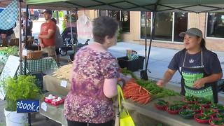 Shoppers use extra caution at downtown farmer's market