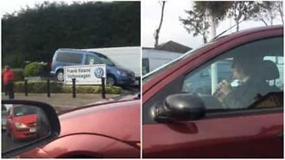 Man plays the flute to deal with traffic stress