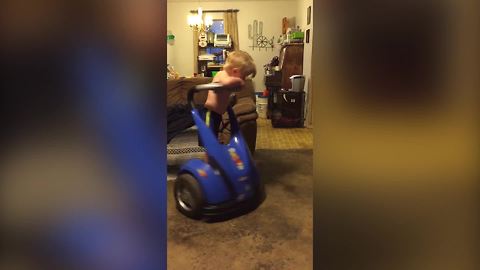 A Young Boy Gets Dizzy After Spinning On A Segway