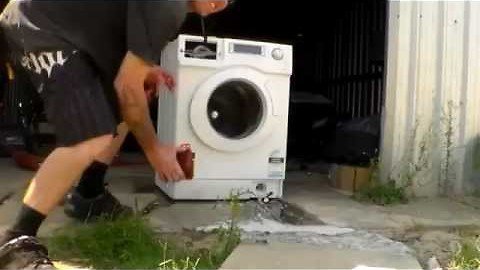 Washing machine gets totalled by brick inside! || Viral Video UK