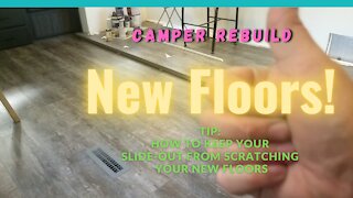 5th Wheel RV Rebuild - Installing Laminate Floor! How to protect slide from scratching wood floors!