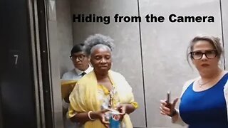 Court workers hide from camera