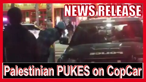 Palestinian VOMITS on Toronto police car & protesters applaud