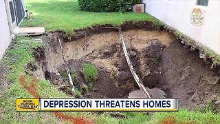 Large depression opens in Pasco Co. neighborhood