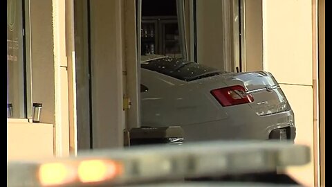 Car crashes into gas station