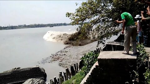 Powerful Tidal Bore Rips Off Dock Ramp After Heavy Rain