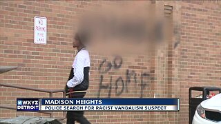 Suspect wanted for spray-painting racist graffiti on Madison Heights building