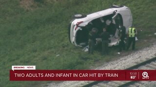2 adults, infant rushed to hospital after crash involving freight train, car in western Palm Beach County