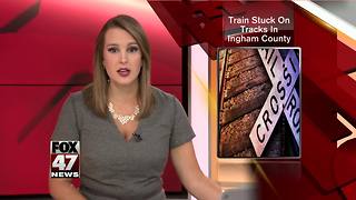 Broken down train blocks roads in Williamstown Twp