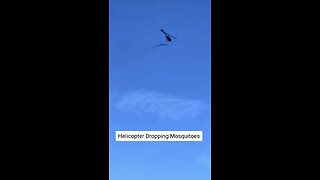 Helicopter 🚁 dropping bio lab mosquitoes on the population