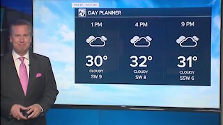 Freezing drizzle and flurries; otherwise cloudy