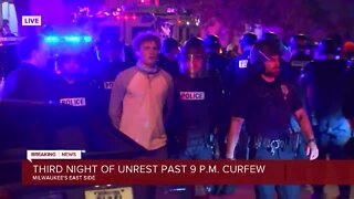 Police make arrests on Milwaukee's east side as people stay out past curfew