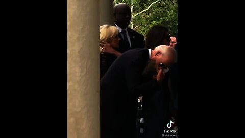 Joe Biden Kissing his grandson at Beau Biden's funeral