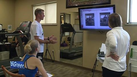 Bellin Run participants use technology to diagnose issues before the race