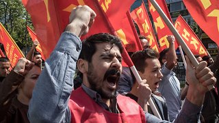 Thousands Worldwide Protest, Celebrate Workers' Rights On May Day