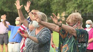 Dozens gather for interfaith vigil at Sarasota church