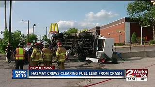 HazMat crews clearing fuel leak from crash