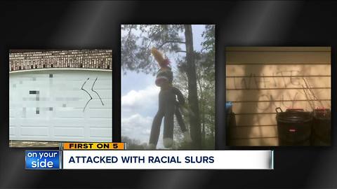 Biracial couple wakes to swastika and 'whites only' message