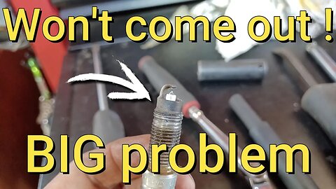 Ford escape stuck spark plug