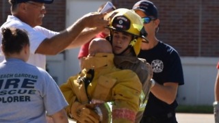 Firefighters help teen's dream come true