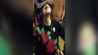 Woman Enjoys Her First VR Experience