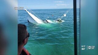 Coast Guard rescues 2 boaters after their boat started sinking