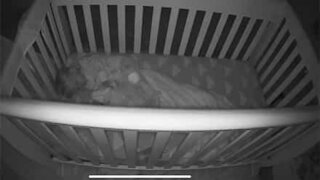 Mysterious light hovers over sleeping baby's crib