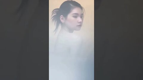 Pale Chinese Girl Bares Her Smooth Silky Shoulder