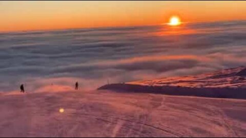 This is what snowboarding above the clouds looks like