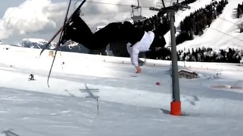 Daredevil Skier Opens A Beer Can During Mid-Air Backflip