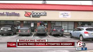 Shot fired during northwest-side cell store robbery