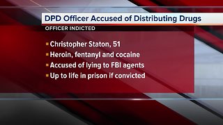 Detroit police officer accused of conspiracy to distribute drugs