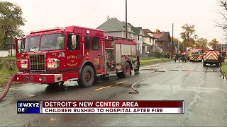 Children rushed to hospital after fire