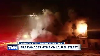 Unoccupied Laurel Street home goes up in flames