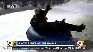 WCPO's Paola Suro takes a ride down giant hill at The Banks